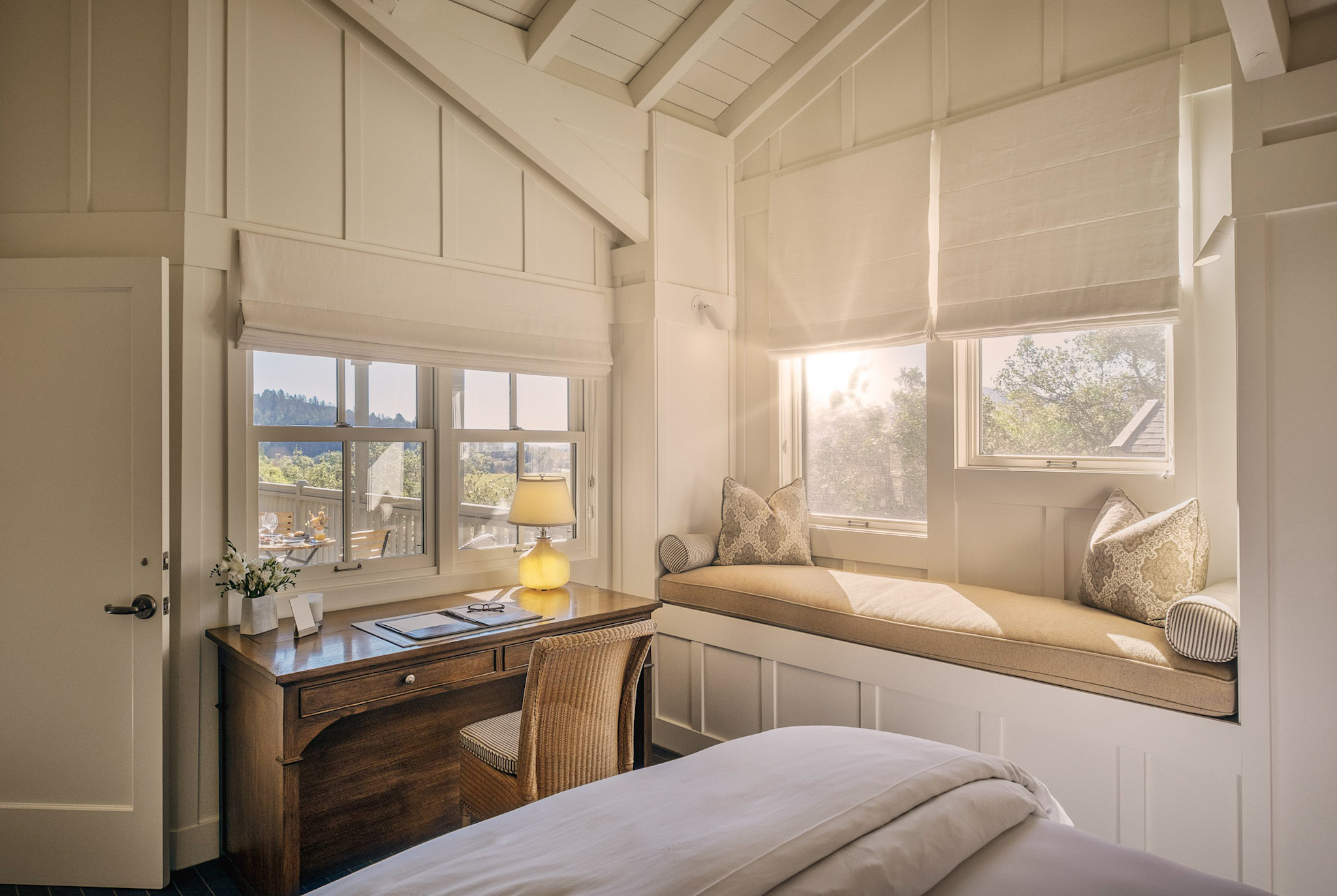 Treeline Suite bedroom with desk and window seat