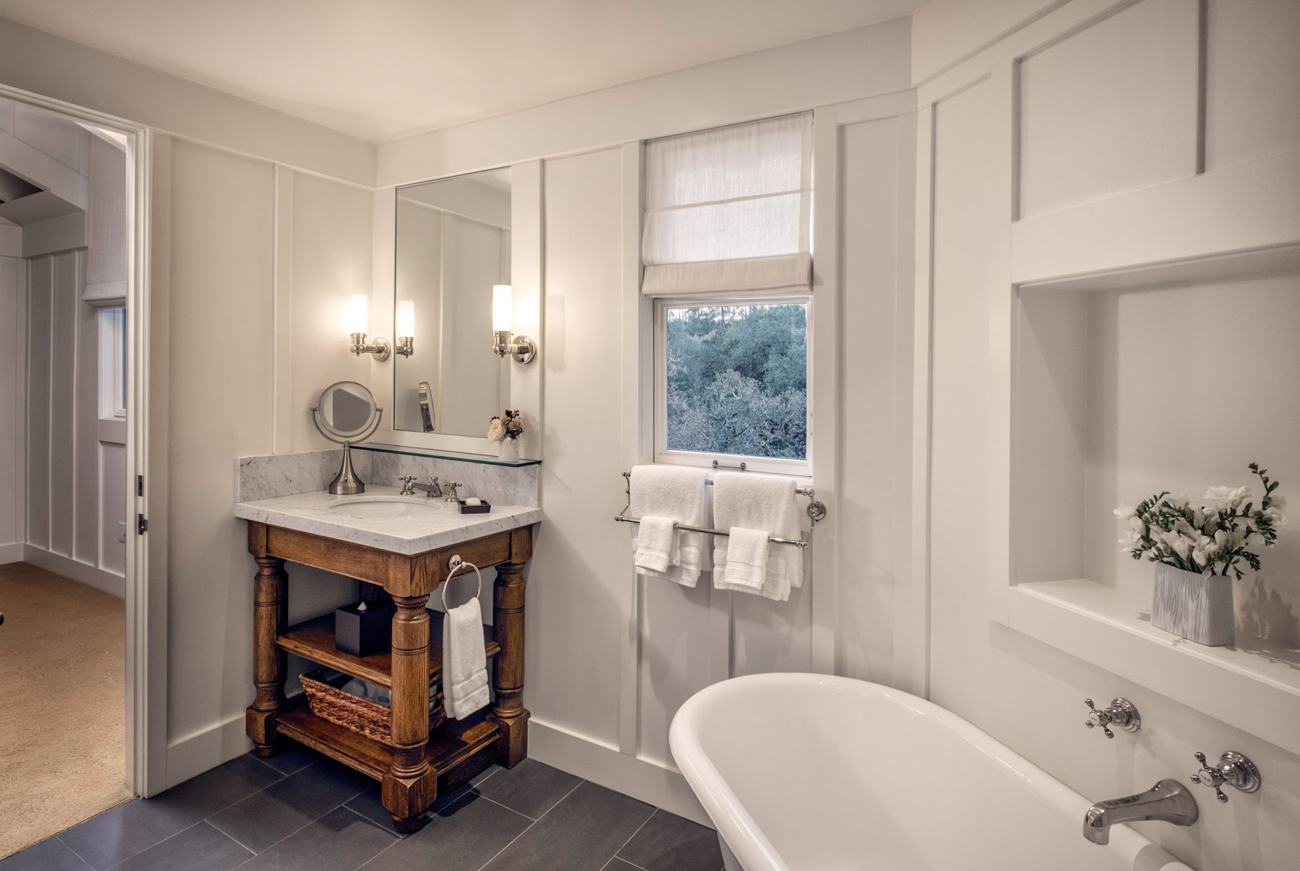 Treetop Room bathroom with deep soaking tub and single vanity