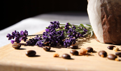 Purple flowers and coffee beans